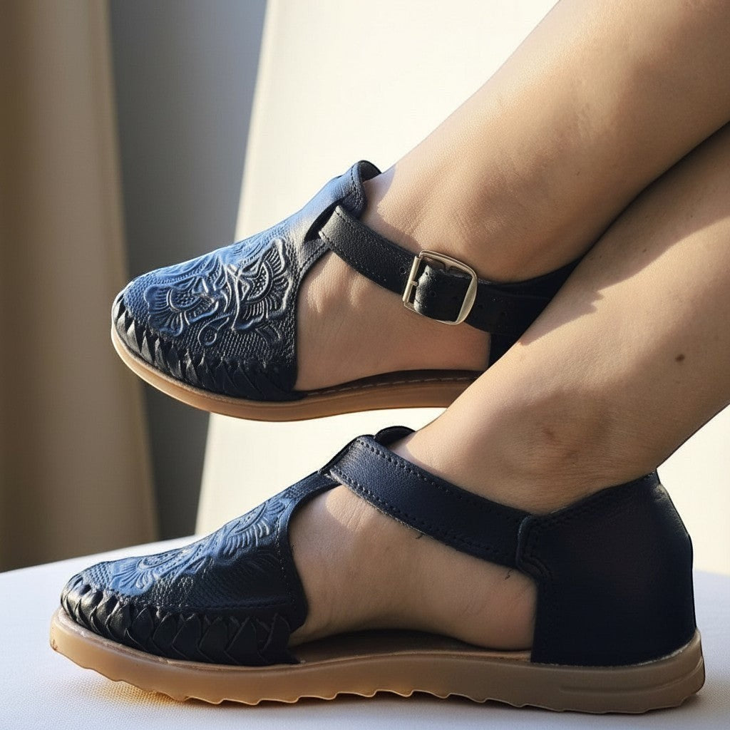 ARTESANALRENVAL black engraved synthetic leather closed-toe espadrille sandals with buckle strap.