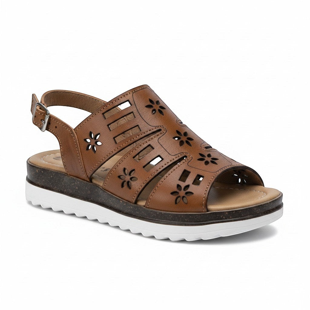 ARTESANALRENVAL brown synthetic leather huarache sandal with floral cutouts and adjustable ankle strap.