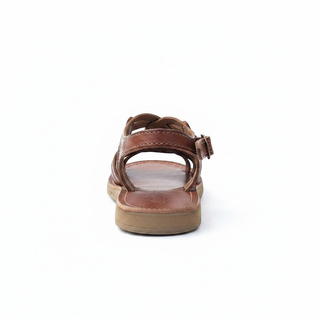 ARTESANALRENVAL traditional brown leather huarache sandals with braided straps and buckle closure.