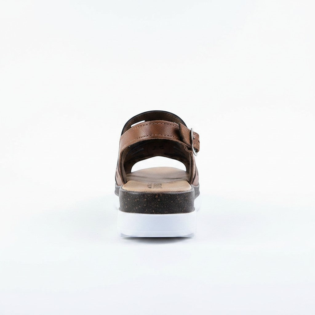 ARTESANALRENVAL brown synthetic leather huarache sandals with adjustable ankle strap and thick two-tone sole.