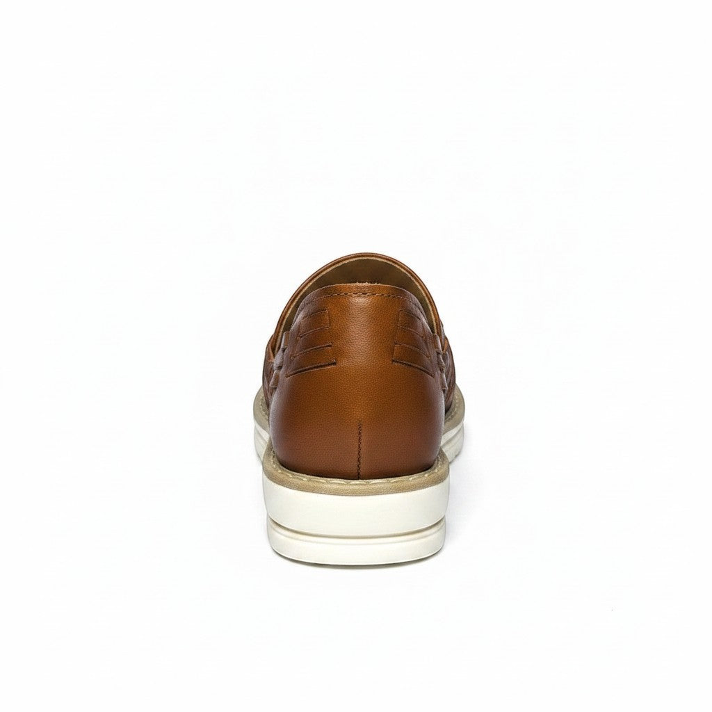ARTESANALRENVAL brown leather huarache with woven detail and white sole. Handcrafted in Mexico.