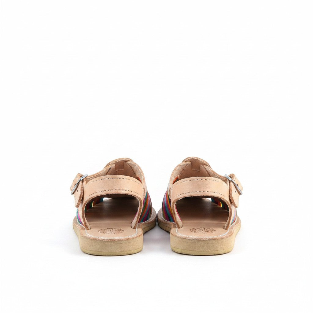 ARTESANALRENVAL colorful leather huarache sandals with rainbow striped straps and buckle closure.