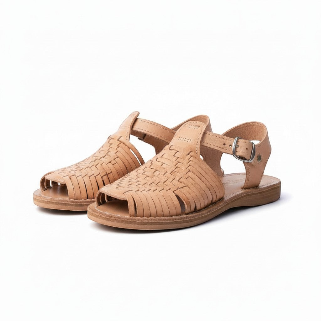 ARTESANALRENVAL natural leather huarache sandals with woven straps and buckle closure.