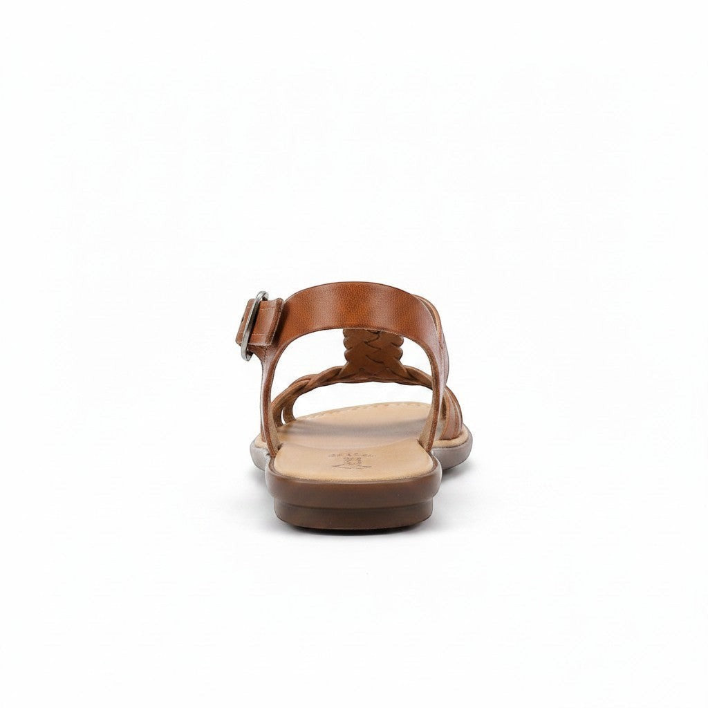 ARTESANALRENVAL traditional tan leather huarache sandals with braided detail and buckle strap.