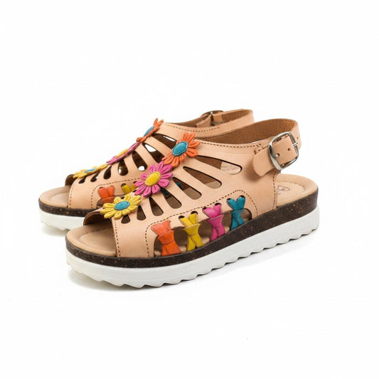 ARTESANALRENVAL tan leather huarache sandals with colorful flower and bow details, open toe, buckle strap, and platform sole.
