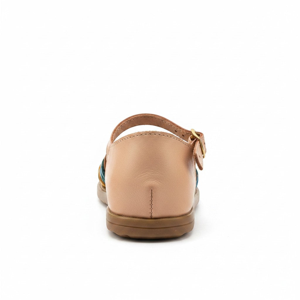 ARTESANALRENVAL Flor del campo tan leather huaraches with colorful woven straps and buckle closure.