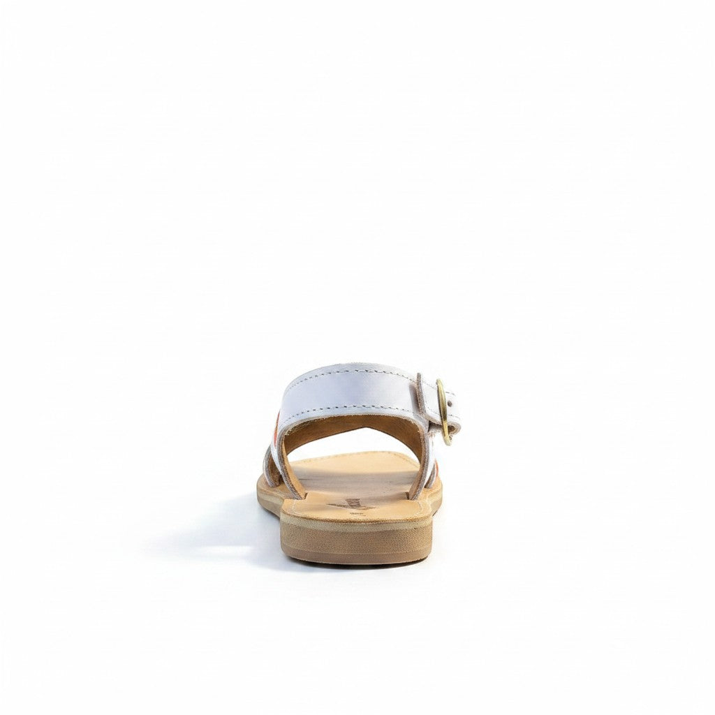 ARTESANALRENVAL white leather huarache sandal with vibrant floral embroidery and gold buckle ankle strap.