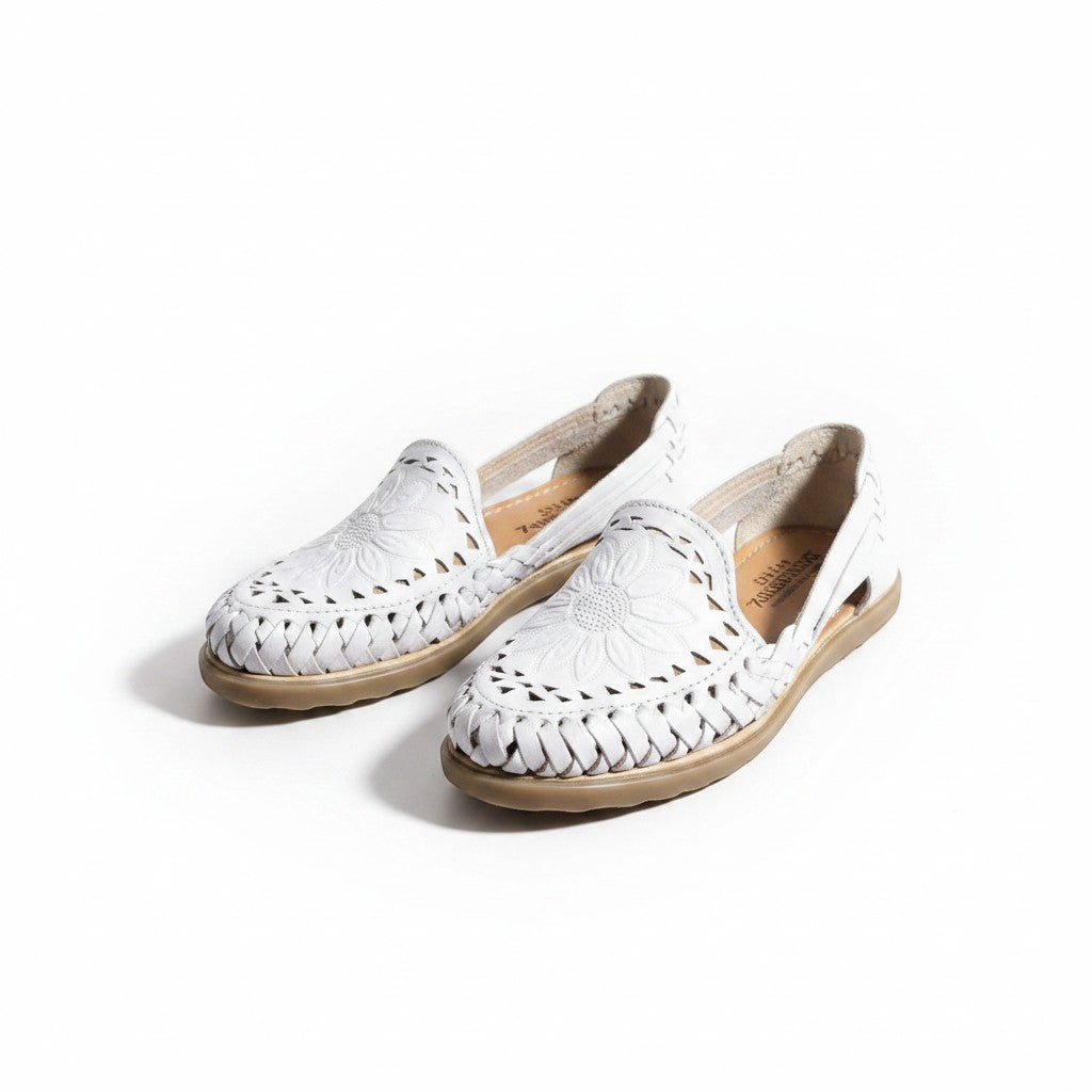 ARTESANALRENVAL white leather huarache flats with woven detail and floral embroidery on the vamp.