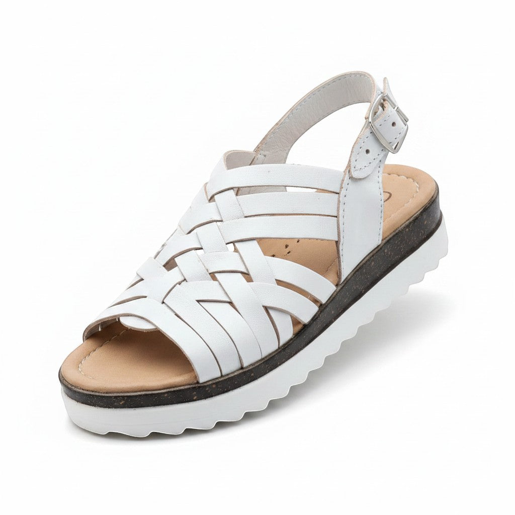 ARTESANALRENVAL white leather woven huarache sandals with adjustable ankle strap and platform sole.