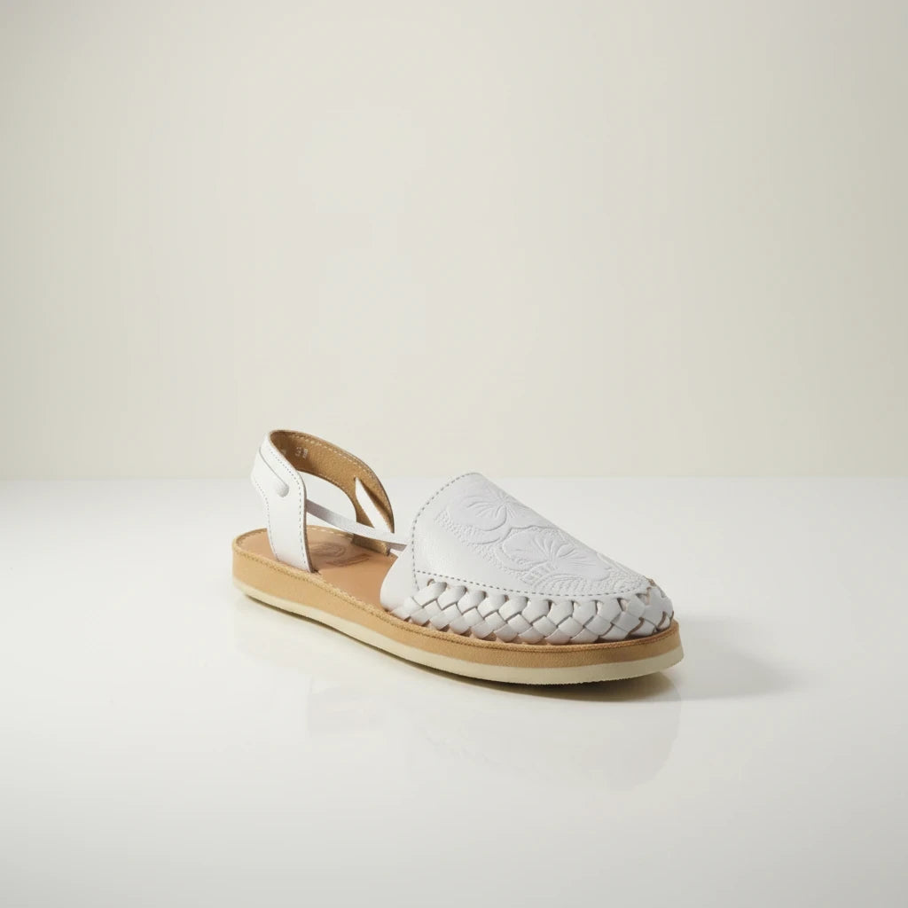 ARTESANALRENVAL white leather huarache sandals with tulip cutout design, cushioned insole, and non-slip sole.